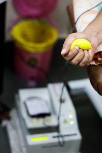Close-up of man holding ice cream