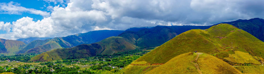 Panoramic view of mountains against sky