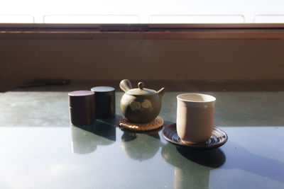 Close-up of coffee cup on table