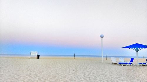 Scenic view of beach against clear sky
