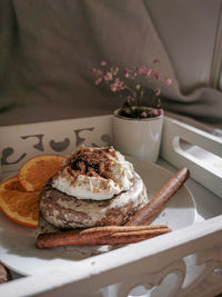 Close-up of cake served on table