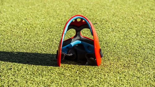 High angle view of skateboard on field