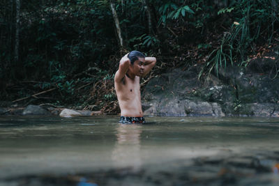 Man swimming in lake