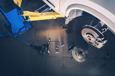 High angle view of worker working on street