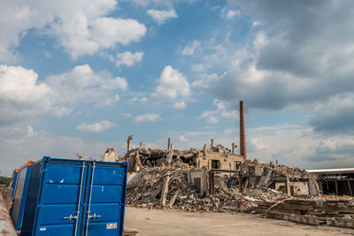 Abandoned factory against sky