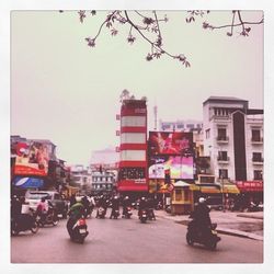 People walking on road in city