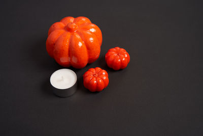 High angle view of tomatoes on table against black background