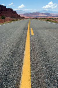 Surface level of road against sky