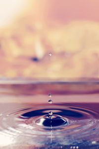 Close-up of drop splashing in water