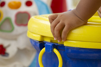 Close-up of hand holding toy