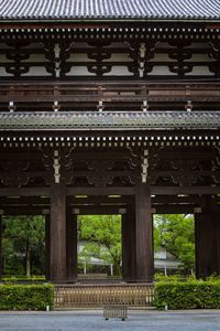 View of bridge over river against building