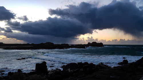 Scenic view of sea against sky during sunset