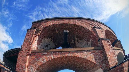 Low angle view of old building against sky