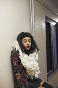 Portrait of a beautiful young woman wearing a leather jacket