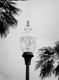 Low angle view of street light against sky