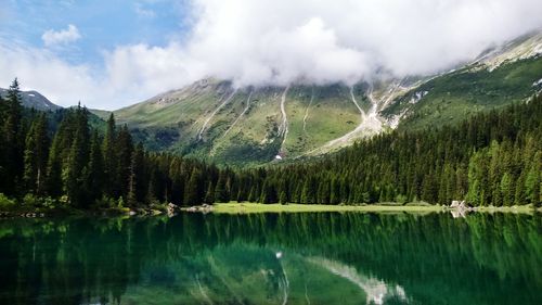 Panoramic view of lake and mountains against sky