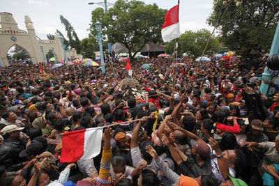 Crowd on street during ritual celebrations