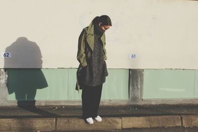 Full length of woman standing in park