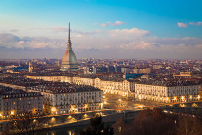 High angle view of illuminated buildings in city