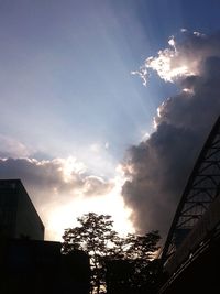 Low angle view of built structure against sunset