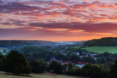 Scenic view of landscape against sky during sunset