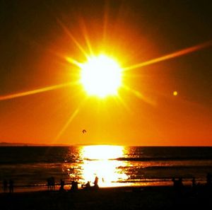 Sun shining over sea