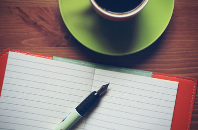 High angle view of coffee cup on table