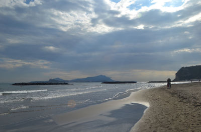 Scenic view of sea against sky during winter