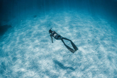 View of person swimming in sea