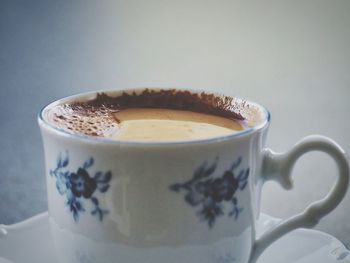 Close-up of cappuccino on table