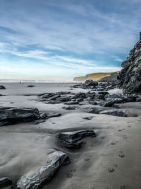 Scenic view of beach against sky