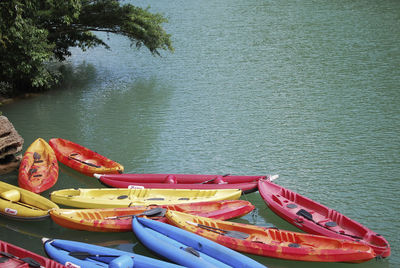 Boats moored in water