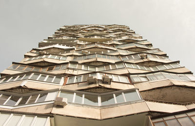Low angle view of modern building against sky
