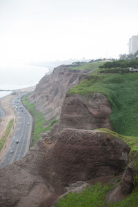 Scenic view of landscape against cloudy sky