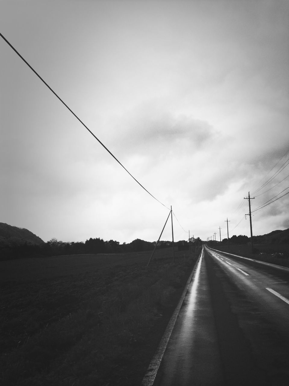 the way forward, sky, transportation, electricity pylon, diminishing perspective, road, connection, vanishing point, power line, power supply, electricity, fuel and power generation, cloud - sky, cloudy, road marking, cable, outdoors, cloud, overcast, long