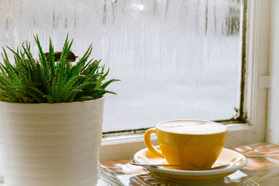 Close-up of coffee served on table
