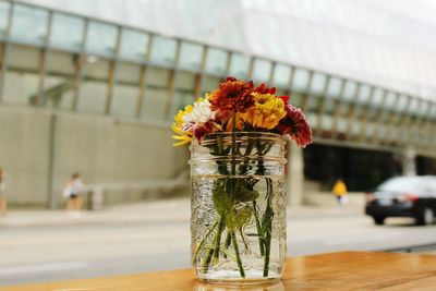 Close-up of flower vase on table