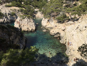 High angle view of rocks in sea