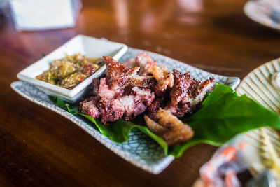 High angle view of meat in plate on table