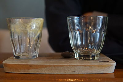 Close-up of beer glass on table