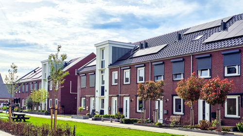 Buildings in city against sky