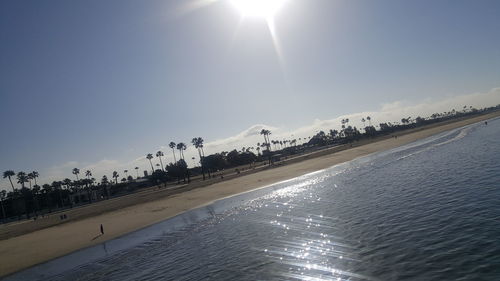 Scenic view of shore against sky
