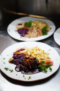 High angle view of food served on table