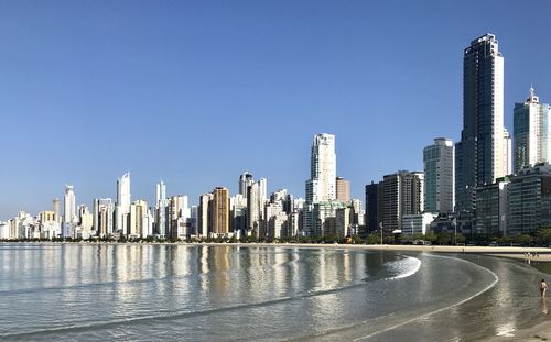 Modern buildings in city at waterfront