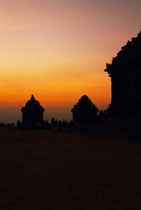 Silhouette of temple at sunset