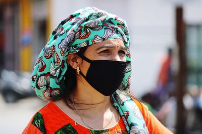 Woman in face mask in corona epidemic.
