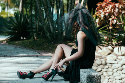 Woman sitting on bench