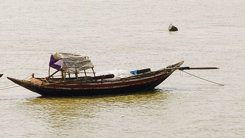 Boat sailing in sea