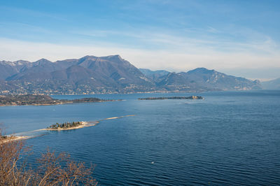 Aerial view of the lake garda with the rabbit island and the garda island from manerba