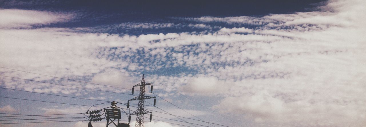 power line, electricity pylon, sky, power supply, electricity, fuel and power generation, technology, cloud - sky, low angle view, cable, connection, cloudy, weather, tranquility, nature, cloud, tranquil scene, day, scenics, beauty in nature